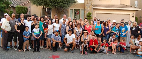 Group of people gathered for National Night Out in Modesto.