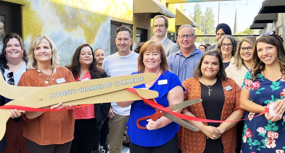 CHS event ribbon cutting team